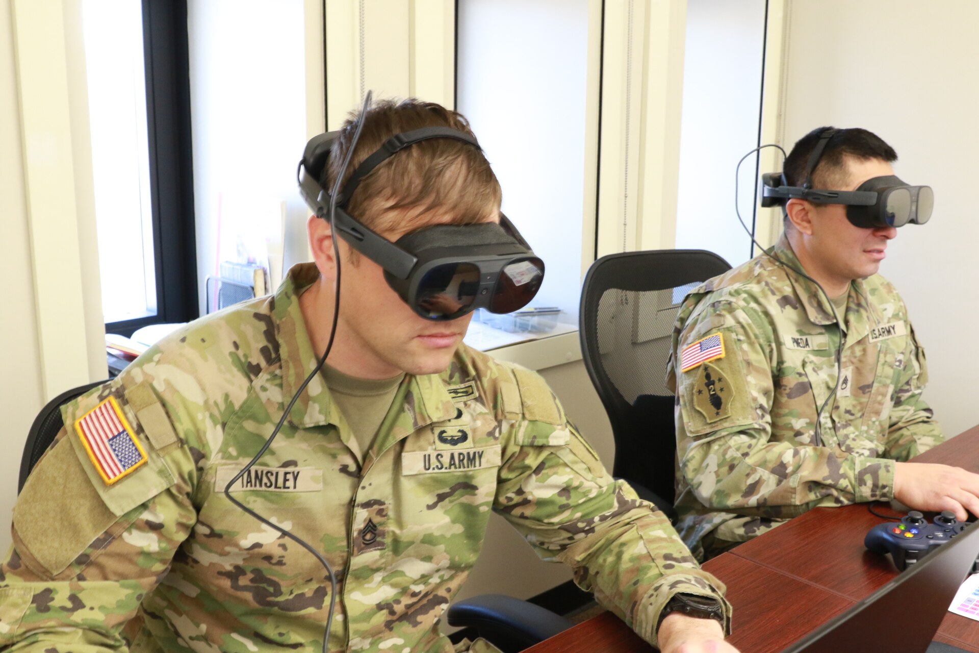 Staff Sgt. Junjun Sun preps for her role as an OC/T by performing the duties in a virtual environment at the First Army OC/T Academy.