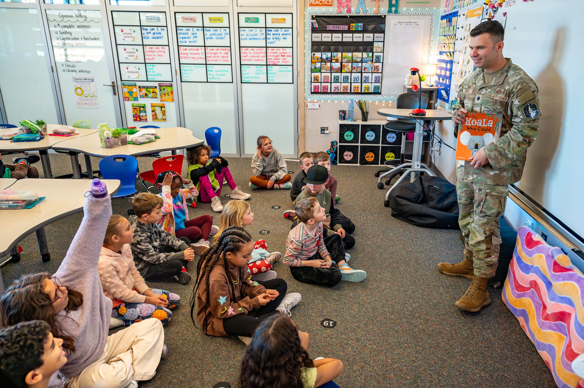 man reads to class