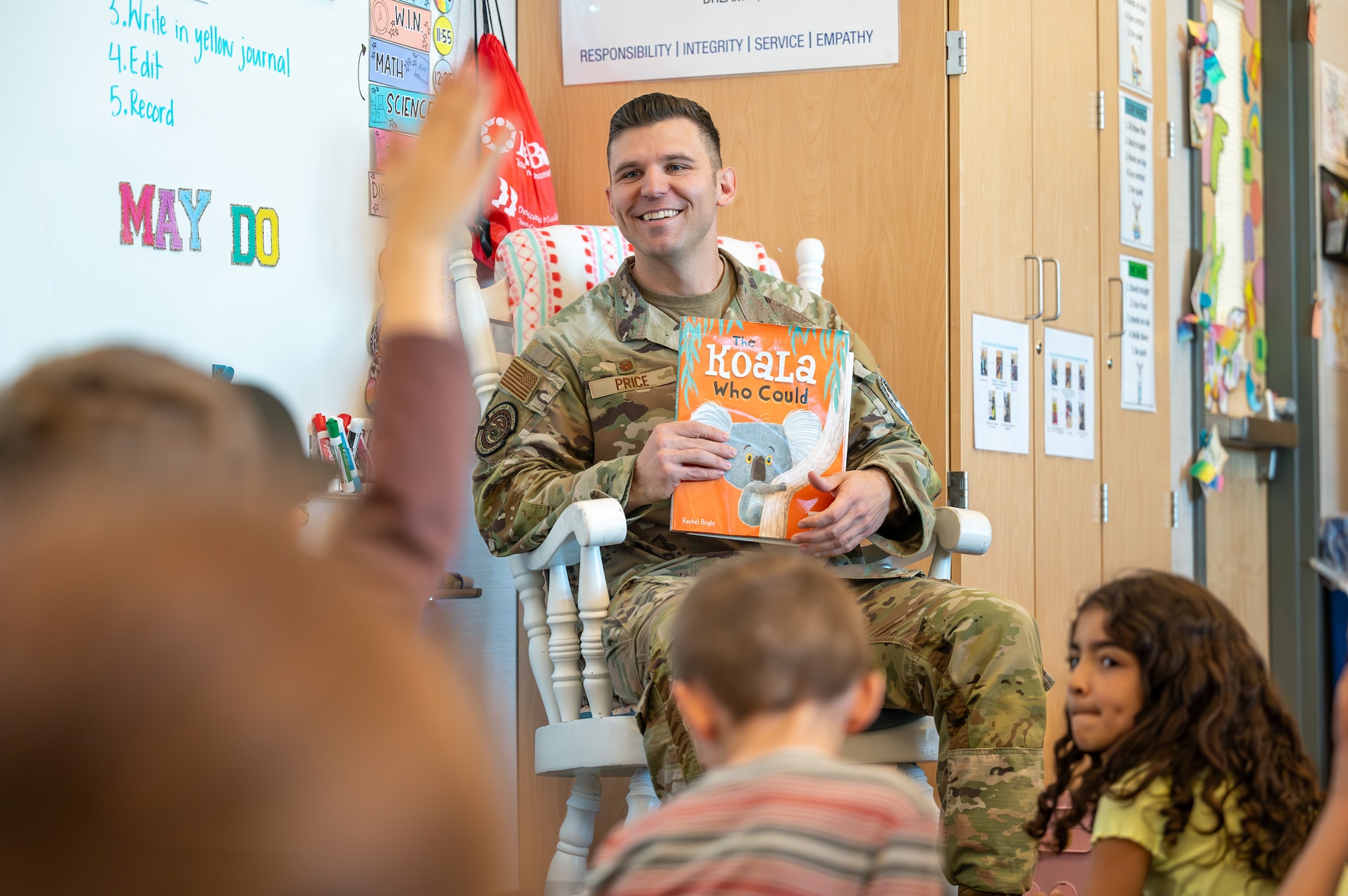 MAN READS TO CLASS