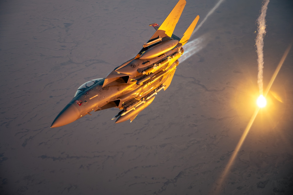 A U.S. Air Force F-15E Strike Eagle performs a flare check over the U.S. Central Command area of responsibility, March 9, 2025. The F-15E is deployed within the CENTCOM AOR to help defend U.S. interests, promote regional security and deter aggression in the region. (U.S. Air Force photo by Senior Airman Zachary Willis)