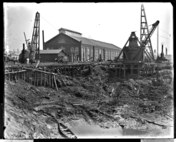This photograph from April 11, 1904 showcases the steam excavator continuing to dig the basin for Dry Dock 3 while supported by a structure of pilings.