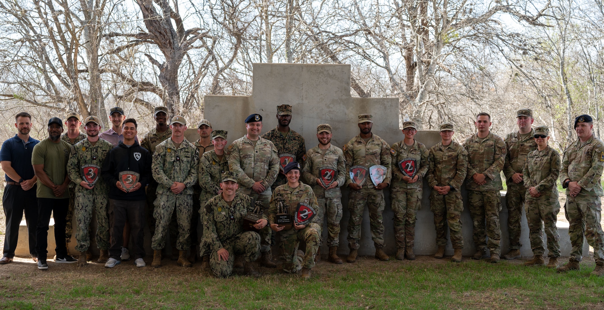 Participants from the 2025 K9 Competition line up for a photo
