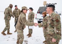 U.S. Air Force Maj. Gen. Stacy Jo Huser, 20th Air Force Commander, greets Airmen from the 91st Missile Security Operations Squadron (91MSOS) at Minot Air Force Base, North Dakota, March 11, 2025. Part of the 91st Security Forces Group at Minot AFB, the 91MSOS protects Team Minot’s Minuteman III missiles and launch facilities. (U.S. Air Force photo by Senior Airman Kendra A. Ransum)
