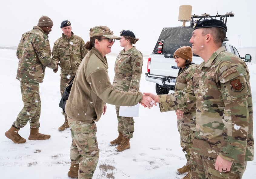 U.S. Air Force Maj. Gen. Stacy Jo Huser, 20th Air Force Commander, greets Airmen from the 91st Missile Security Operations Squadron (91MSOS) at Minot Air Force Base, North Dakota, March 11, 2025. Part of the 91st Security Forces Group at Minot AFB, the 91MSOS protects Team Minot’s Minuteman III missiles and launch facilities. (U.S. Air Force photo by Senior Airman Kendra A. Ransum)