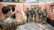 Chief Master Sgt. Nicholas Taylor, 20th Air Force Command Chief Master Sergeant, poses for a group photo with Airmen from the 91st Missile Security Operations Squadron (91MSOS) at Minot Air Force Base, North Dakota, March 11, 2025. The 91MSOS uses airsoft guns to practice a variety of scenarios within the squadron’s training bay. (U.S. Air Force photo by Senior Airman Kendra A. Ransum)