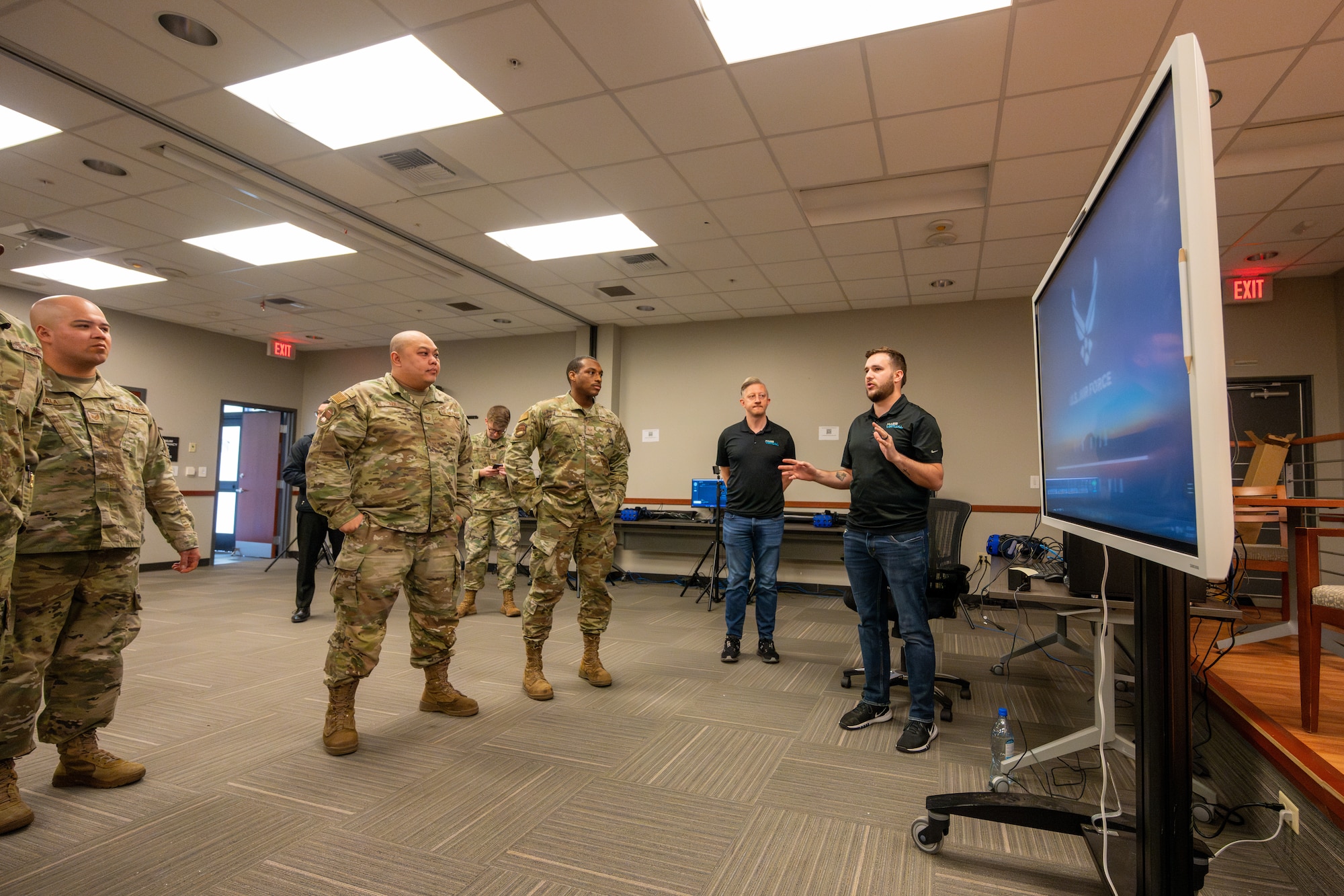 Airmen observe VR training technology