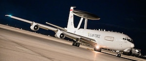 A U.S. Air Force E-3 Sentry Airborne Warning and Control System (AWACS) aircraft prepares for departure at Nellis Air Force Base, Nevada, during Red Flag 25-2. The AWACS provides real-time battle management, surveillance, and command and control, enhancing situational awareness for allied forces.

(U.S. Air Force photo by Garrett N. Cole)