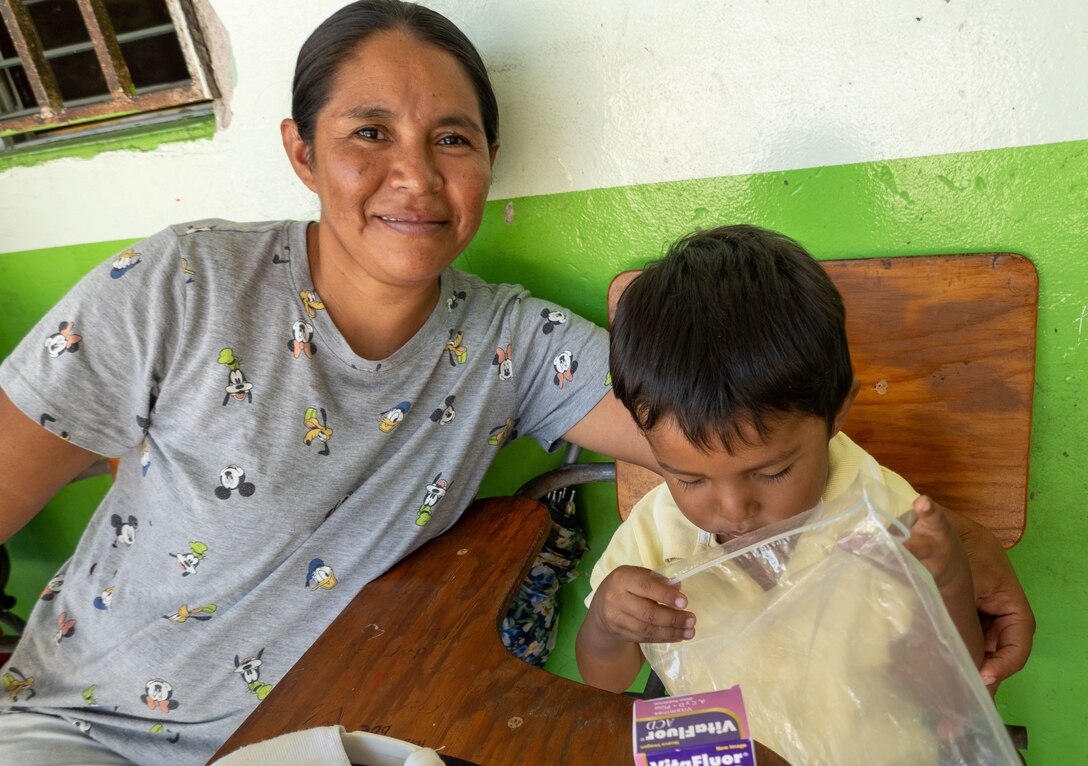 A woman poses with her child for photo during a JTF-Bravo medical mission in La Paz, Honduras, March 12, 2025. These medical missions have become a hallmark of JTF-Bravo's enduring legacy in the region, demonstrating their unwavering dedication to building a stronger and more resilient Honduras and Central America. (U.S. Army courtesy photo)