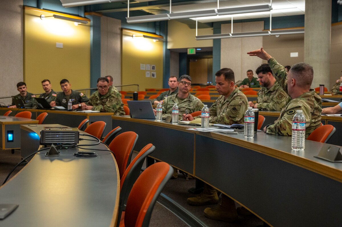 Joint Exercise Training Working Group-West conference participants listen to U.S. Army Brig. Gen. Bernard Harrington, I Corps deputy commanding general, during the final briefing of the second iteration of the JETWG-West conference at Joint Base Lewis-McChord, Washington, March 12, 2025.