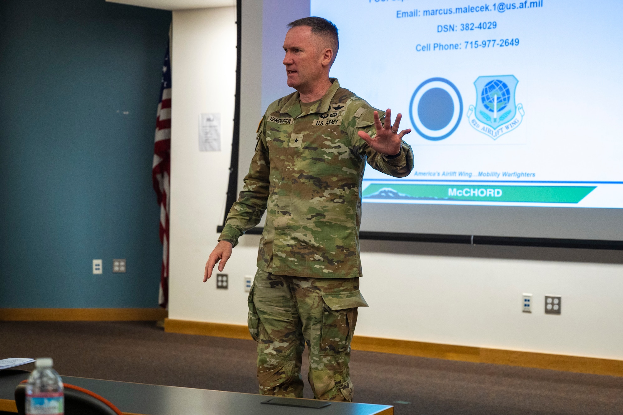 U.S. Army Brig. Gen. Bernard Harrington, I Corps deputy commanding general, gives closing remarks during the final briefing of the second iteration of the Joint Exercise Training Working Group-West conference at Joint Base Lewis-McChord, Washington, March 12, 2025.