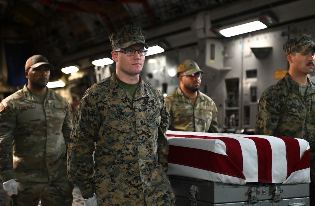 U.S. service members from the Defense POW/MIA Accounting Agency prepare to conduct an honorable carry ceremony at Joint Base Pearl Harbor-Hickam, Hawaii, March 14, 2025.  The 34 sets of unknown remains were previously buried in the Philippines, and they will be examined by forensic anthropologists and odontologists at DPAA’s skeletal identification laboratory. DPAA conducts global search, recovery and laboratory operations to provide the fullest possible accounting for America’s missing personnel to their families and the nation.
