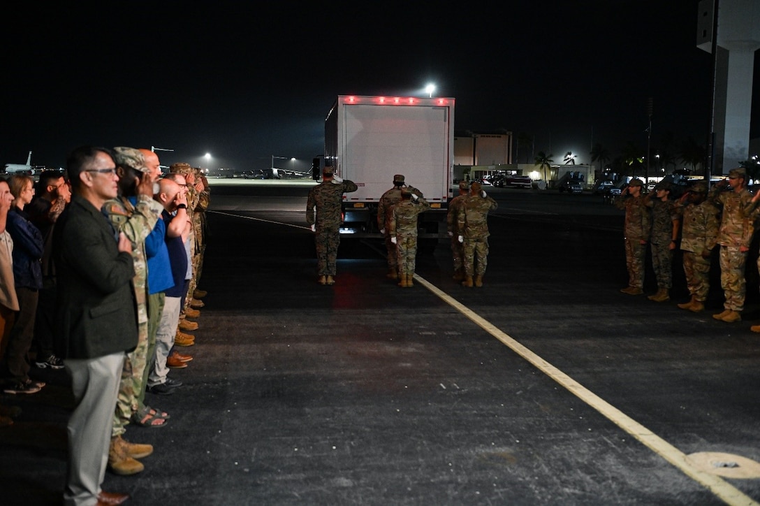 U.S. service members from the Defense POW/MIA Accounting Agency prepare to conduct an honorable carry ceremony at Joint Base Pearl Harbor-Hickam, Hawaii, March 14, 2025.  The 34 sets of unknown remains were previously buried in the Philippines, and they will be examined by forensic anthropologists and odontologists at DPAA’s skeletal identification laboratory. DPAA conducts global search, recovery and laboratory operations to provide the fullest possible accounting for America’s missing personnel to their families and the nation.