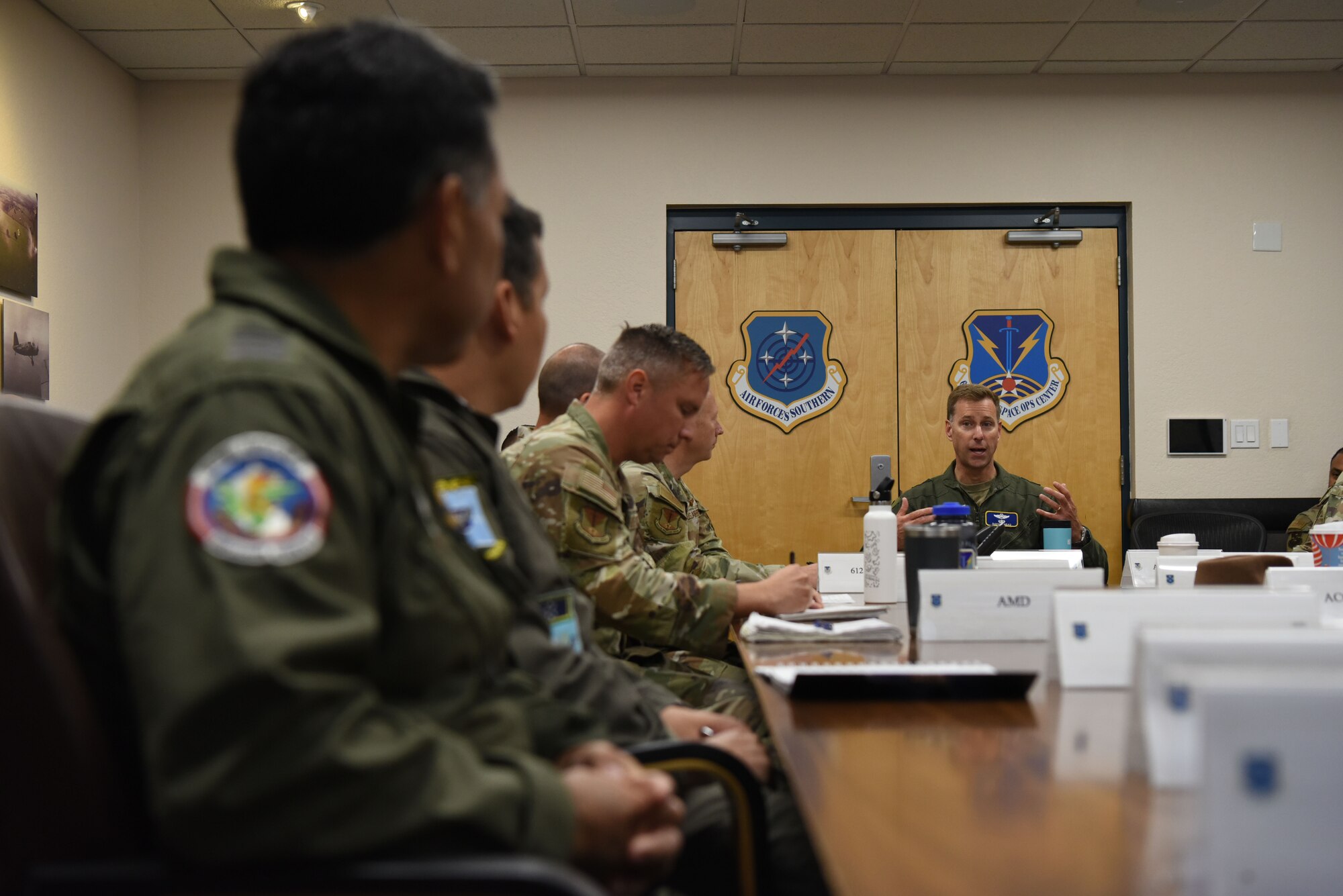 Maj. Gen. David Mineau, Air Forces Southern commander, provides remarks during a Combined Forces Air Component Commander update briefing at Davis-Monthan Air Force Base, Arizona, March 5, 2025. The briefing marked phase one for the Liaison Officers from Argentina, Brazil, Chile, Colombia, Ecuador, and Peru, joining U.S. Air Force personnel at the 612th Air Operations Center, marking a significant milestone in coalition air power coordination. (U.S. Air Force photo by Master Sgt. Kenneth New)