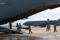 Reserve Citizen Airmen assigned to the 433rd Airlift Wing stow medical supplies and training equipment inside a C-17 Globemaster III during an aeromedical evacuation exercise onboard Naval Station (NAVSTA) Rota, Spain, March 10, 2025.