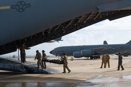 Reserve Citizen Airmen assigned to the 433rd Airlift Wing stow medical supplies and training equipment inside a C-17 Globemaster III during an aeromedical evacuation exercise onboard Naval Station (NAVSTA) Rota, Spain, March 10, 2025.