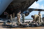 Reserve Citizen Airmen assigned to the 433rd Airlift Wing prepare medical supplies and training equipment during an aeromedical evacuation exercise onboard Naval Station (NAVSTA) Rota, Spain, March 10, 2025.