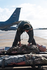 Staff Sgt. Evan Johnson, a Reserve Citizen Airman assigned to the 433rd Airlift Wing, prepares medical supplies and training equipment inside during an aeromedical evacuation exercise onboard Naval Station (NAVSTA) Rota, Spain, March 10, 2025.