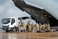Reserve Citizen Airmen assigned to the 433rd Airlift Wing stow medical supplies and training equipment inside a C-17 Globemaster III during an aeromedical evacuation exercise onboard Naval Station (NAVSTA) Rota, Spain, March 10, 2025.