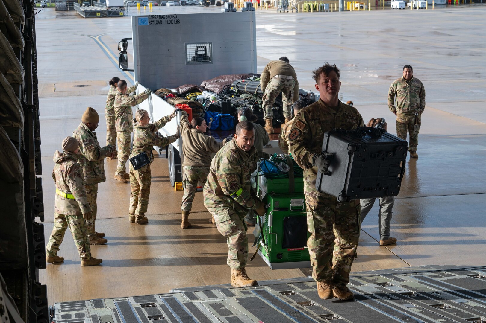Reserve Citizen Airmen assigned to the 433rd Airlift Wing stow medical supplies and training equipment inside a C-17 Globemaster III during an aeromedical evacuation exercise onboard Naval Station (NAVSTA) Rota, Spain, March 10, 2025.