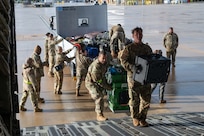 Reserve Citizen Airmen assigned to the 433rd Airlift Wing stow medical supplies and training equipment inside a C-17 Globemaster III during an aeromedical evacuation exercise onboard Naval Station (NAVSTA) Rota, Spain, March 10, 2025.