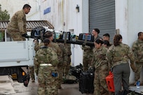 Reserve Citizen Airmen assigned to the 433rd Airlift Wing prepare gear during an aeromedical evacuation exercise onboard Naval Station (NAVSTA) Rota, Spain, March 10, 2025.