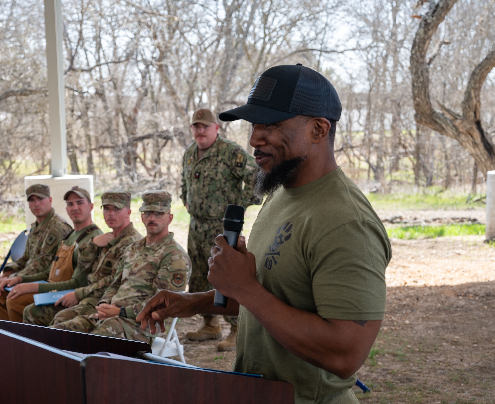 Senior Chief, United States Navy (Ret.) Ekali Brooks delivers a speech to the 2025 DoD K-9 Competition participants