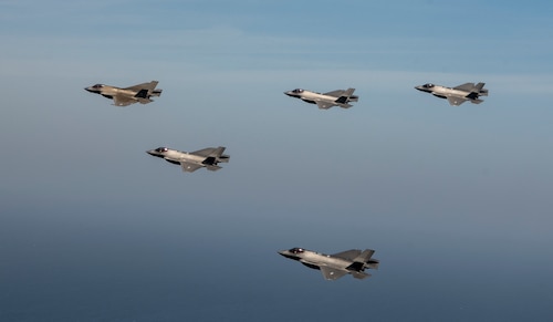 Two U.S. Air Force F-35A Lighting IIs, two ROKAF F-35As and one U.S. Navy F-35C fly in formation during integration training as part of Freedom Shield 25, March 13, 2025.