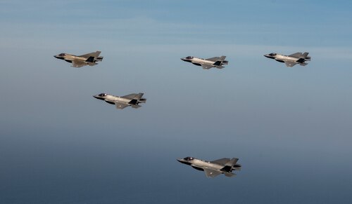 Two U.S. Air Force F-35A Lighting IIs, two ROKAF F-35As and one U.S. Navy F-35C fly in formation during integration training as part of Freedom Shield 25, March 13, 2025.