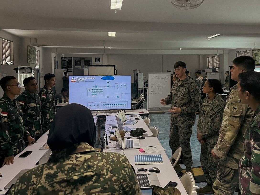 U.S. Marines with 9th Communication Battalion, I Marine Expeditionary Force Information Group, alongside service members with the Royal Thai Armed Forces, Japan Ground Self-Defense Force, Malaysia, Indonesia, Singapore, Australia, and Republic of Korea Marines, participate in a cyber exercise during Exercise Cobra Gold 2025, March 4, 2025. The exercise focused on building and improving basic defensive cyber capabilities critical for enabling integrated deterrence against threat cyber operations. Cobra Gold is the largest joint and combined exercise in mainland Asia, held annually in Thailand, showcasing the U.S. commitment to the region by building interoperability, multilateral cooperative arrangements, and advancing common interests through our commitment to allies and partners in ensuring a free and open Indo-Pacific. MRF-SEA is a rotational unit derived from elements of I MEF executing a U.S. Marine Corps Forces, Pacific operational model that involves training events and exchanges with partner military subject matter experts, promotes security goals with allied and partner nations, and ensures a persistent I MEF stand-in presence west of the international date line. (Courtesy Asset)