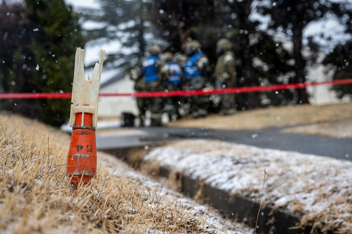 Airmen cordon off an area