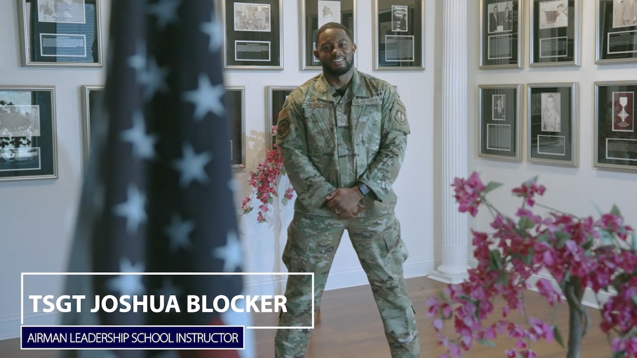 Man in military uniform standing, posing for photo