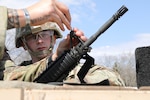 U.S. Army National Guard Spc. Brian Hayes watches as his weapon is zeroed during the 2025 Tennessee Best Warrior Competition March 13, 2025. Hayes won Soldier of the Year in the state competition.