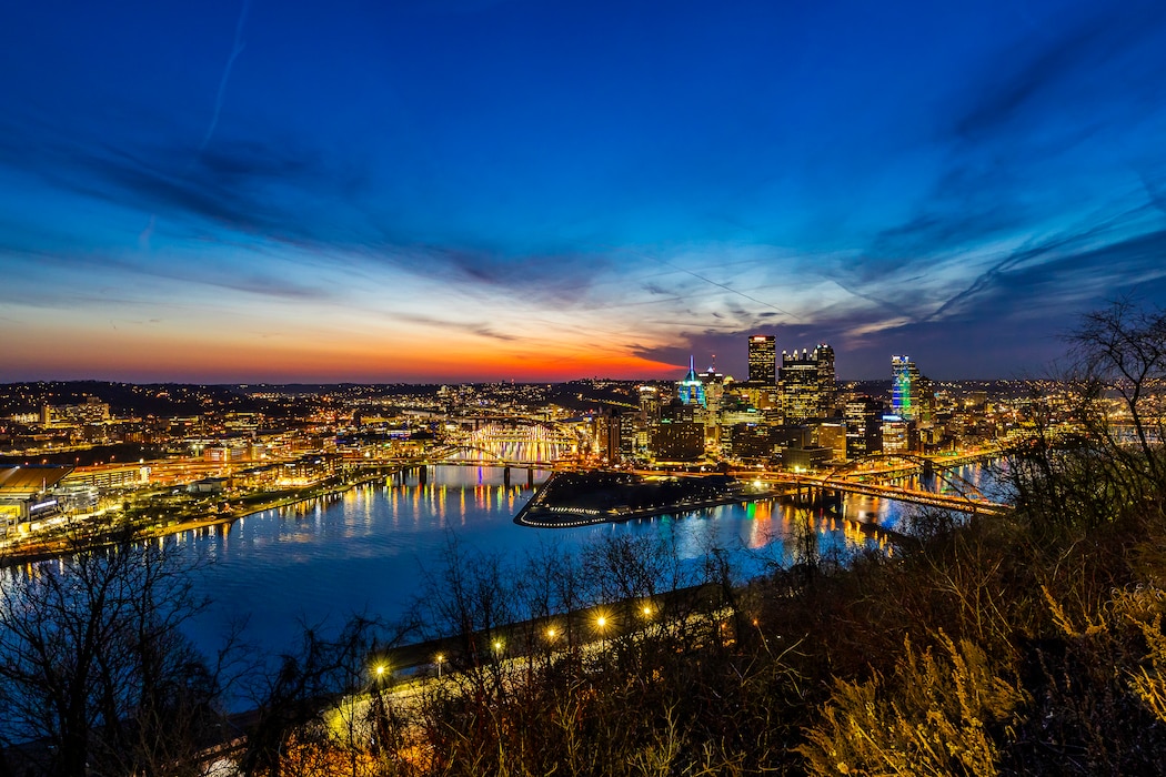 The sun rises over the Pittsburgh skyline March 13, 2025.