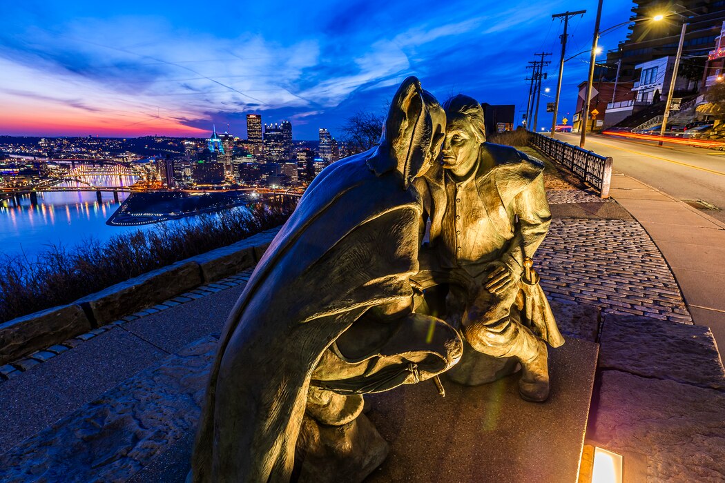 The sun rises over the Pittsburgh skyline March 13, 2025.