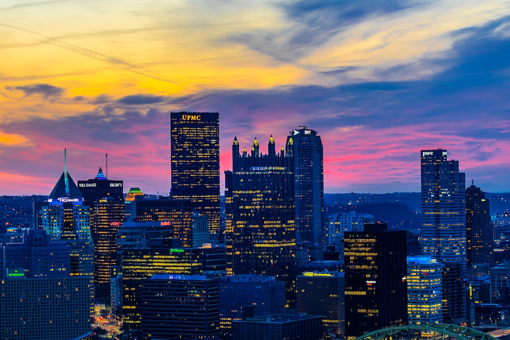 The sun rises over the Pittsburgh skyline March 13, 2025.