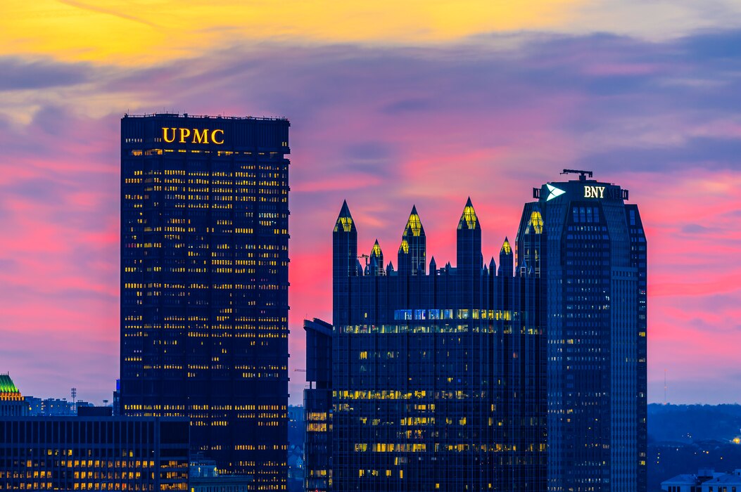 The sun rises over the Pittsburgh skyline March 13, 2025.