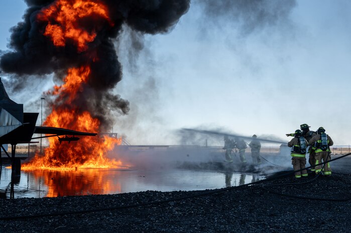 Hill and Mountain Home Air Force Base firefighters joined for training exercise where they tested equipment configured for new firefighting foam Fluorine-Free Foam on a JP-8 fuel burning fire.