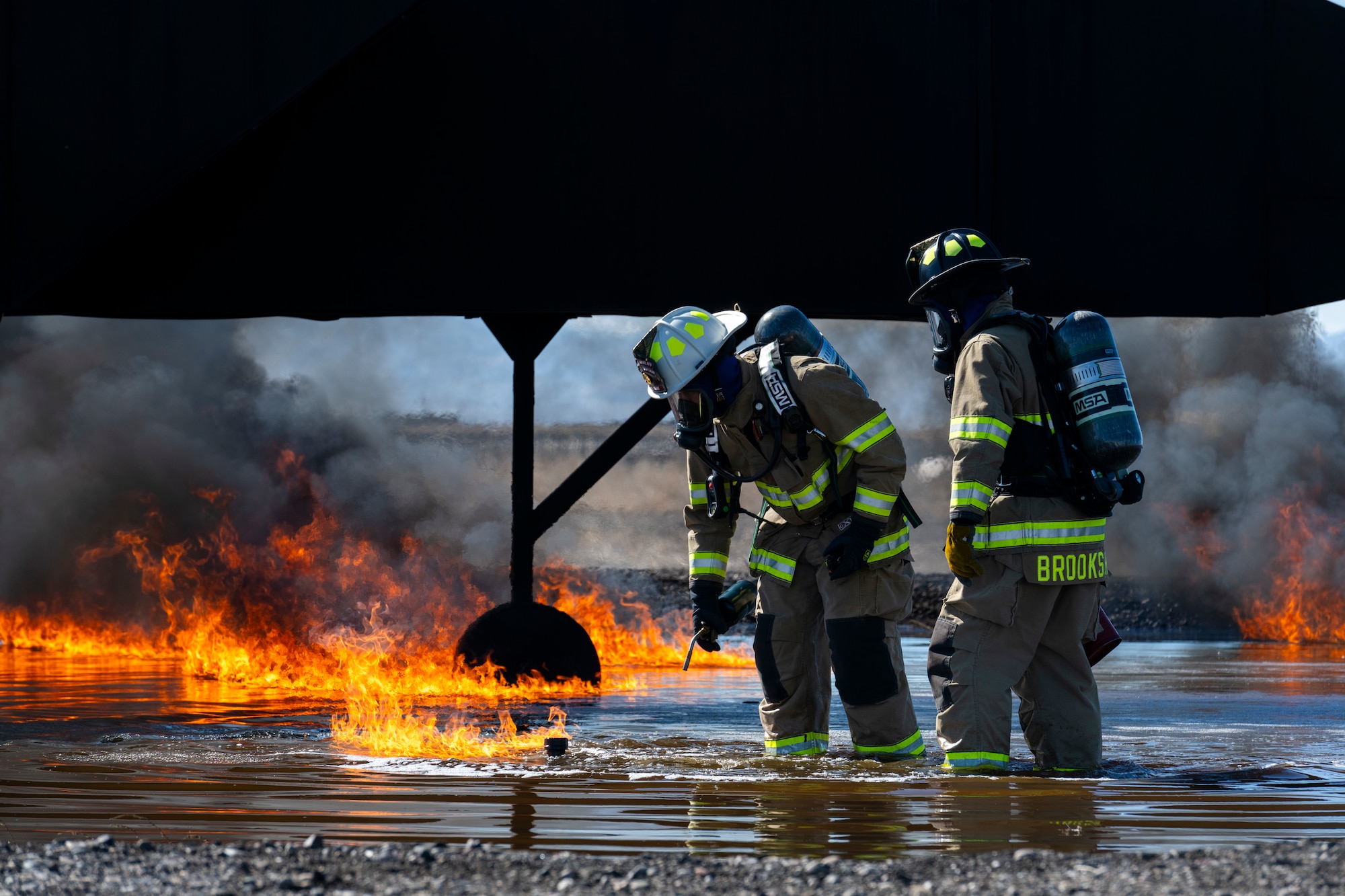 Hill and Mountain Home Air Force Base firefighters joined for training exercise where they tested equipment configured for new firefighting foam Fluorine-Free Foam on a JP-8 fuel burning fire.