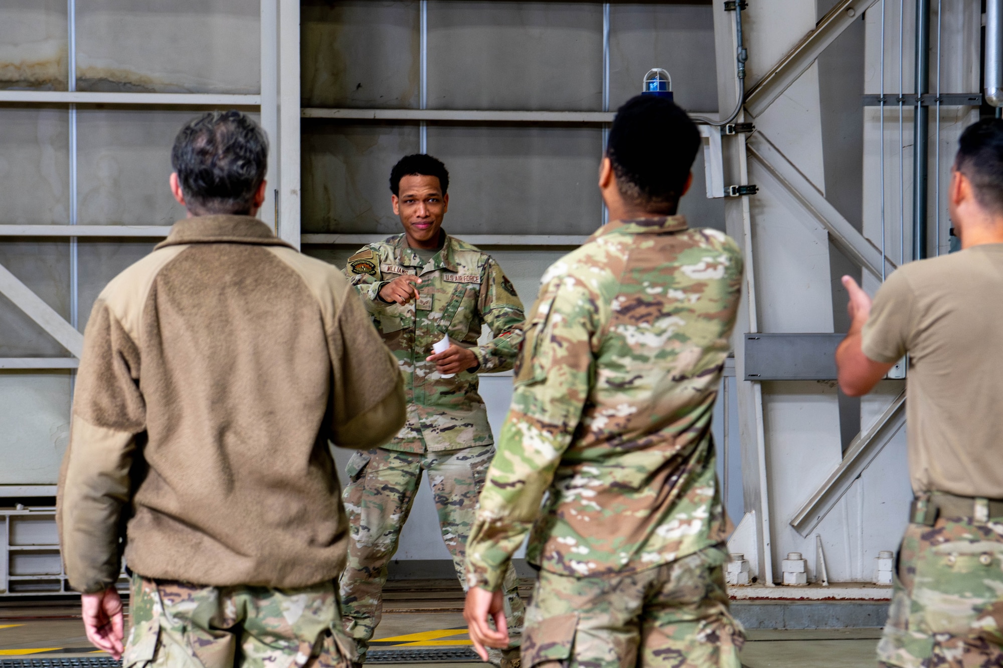 Airmen assigned to the 374th Maintenance Group play charades.