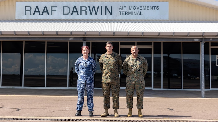 U.S. Marine Corps Col. Jason C. Armas, center, the commanding officer of Marine Rotational Force – Darwin 25.3, and Sgt. Maj. Michael T. Escobar, right, the sergeant major of MRF – D 25.3, pose for a photo with Group Captain Melissa Neilson, the commander of Northern Command, at Royal Australian Air Force Base Darwin, Northern Territory, Australia, March 17, 2025.
