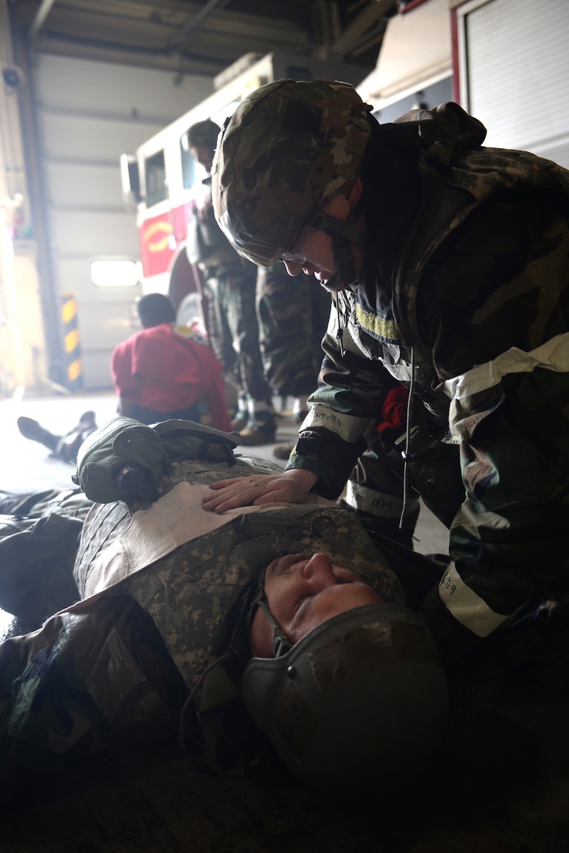 U.S. Air Force medics transport a simulated casualty to the Urgent Care Center during Freedom Shield 25 at Osan Air Base, Republic of Korea, Mar. 11, 2025. Freedom Shield 25 is a defense-oriented exercise focused on fortifying response capabilities to safeguard security on the peninsula. Transporting an injured person after performing tactical combat casualty care is a process that’s regularly practiced during exercises at Osan. (U.S. Air Force photo by Master Sgt. Jerilyn Quintanilla)