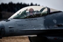 Pilot poses for a photo