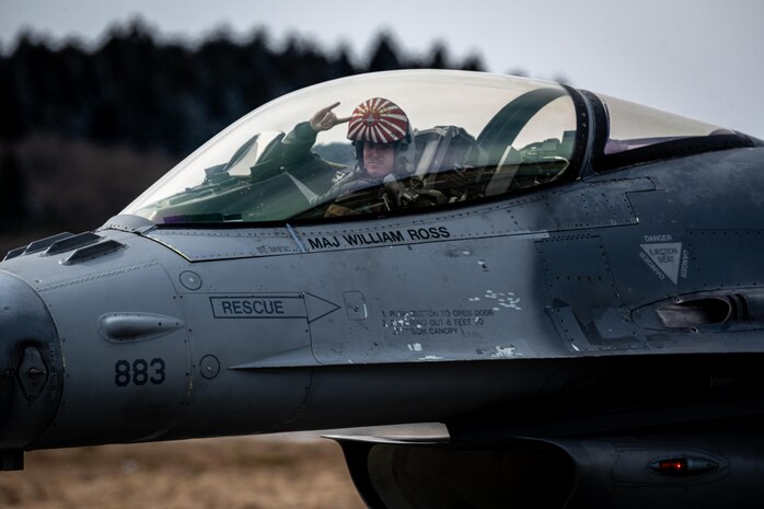 Pilot poses for a photo