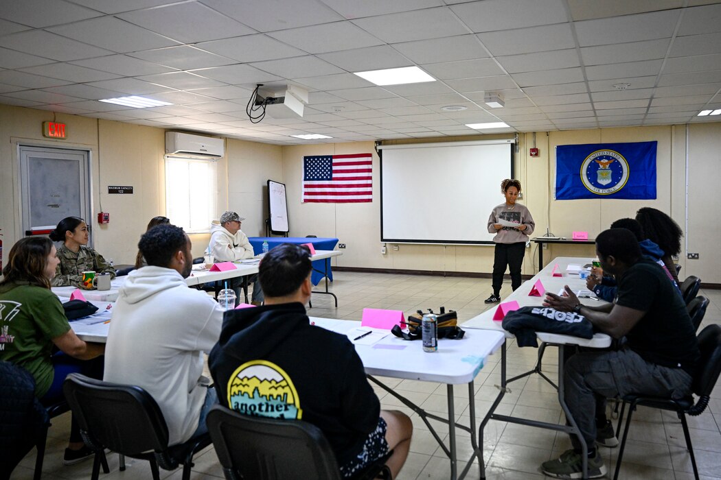 A teacher speaks in a class.