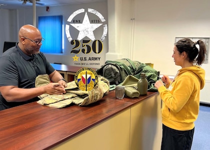 Adreaell Ray (left) is the Logistics Readiness Center Stuttgart Central Issue Facility chief. Ray, who retired in 2021 after 24 years of active-duty service, has been working at the CIF as an Army Civilian since December. He said, “I feel blessed to be a part of this commemorative moment in the U.S. Army’s long and distinguished history. 250 years! Happy birthday, U.S. Army!” (U.S. Army courtesy photo)