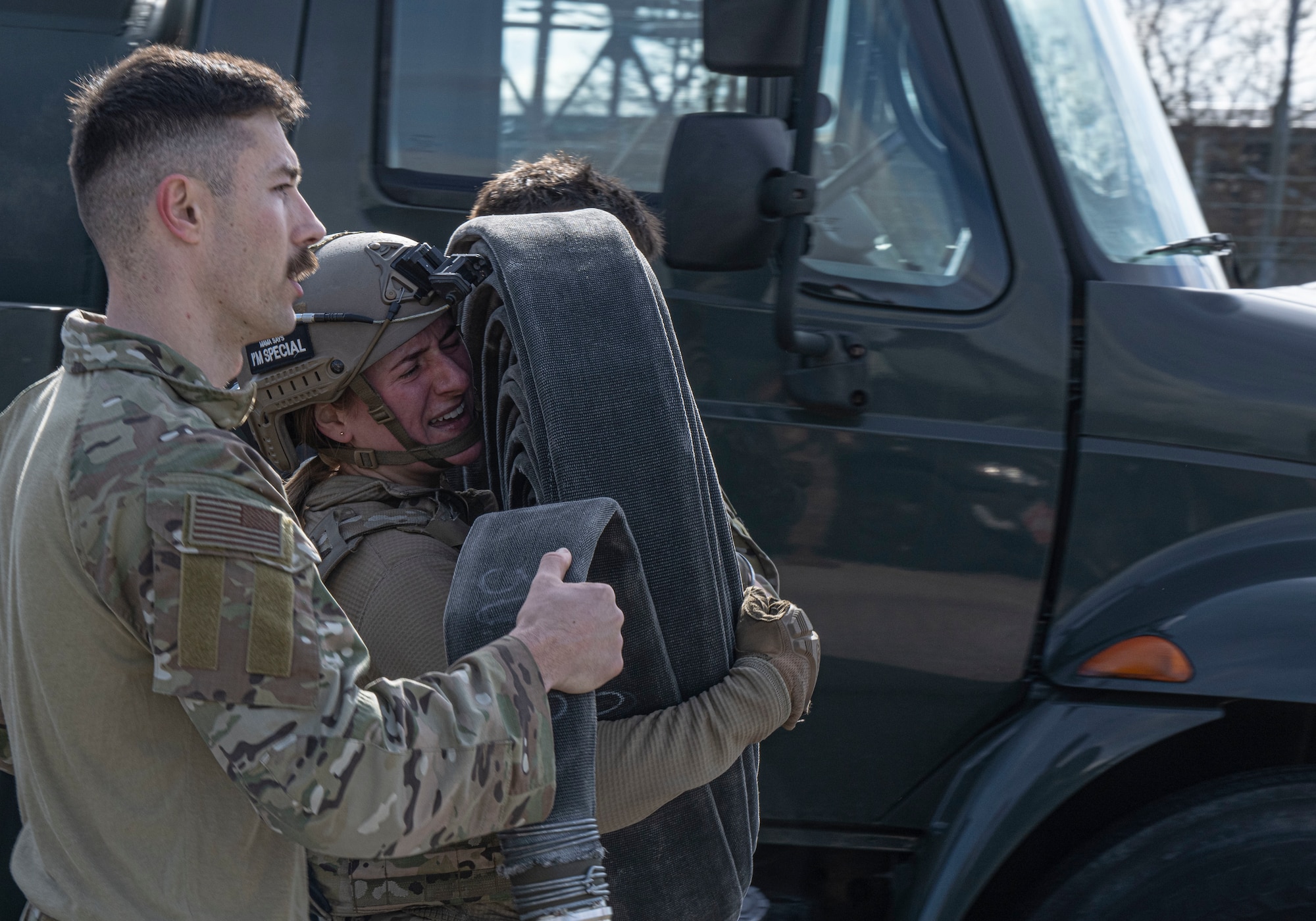 U.S. Air Force 2nd Lt. Claire Stewart, 100th Logistics Readiness Squadron traffic management office officer in charge, carries a fuel hose during her forward area refueling point team tryout at RAF Mildenhall, England, March 14, 2025.
