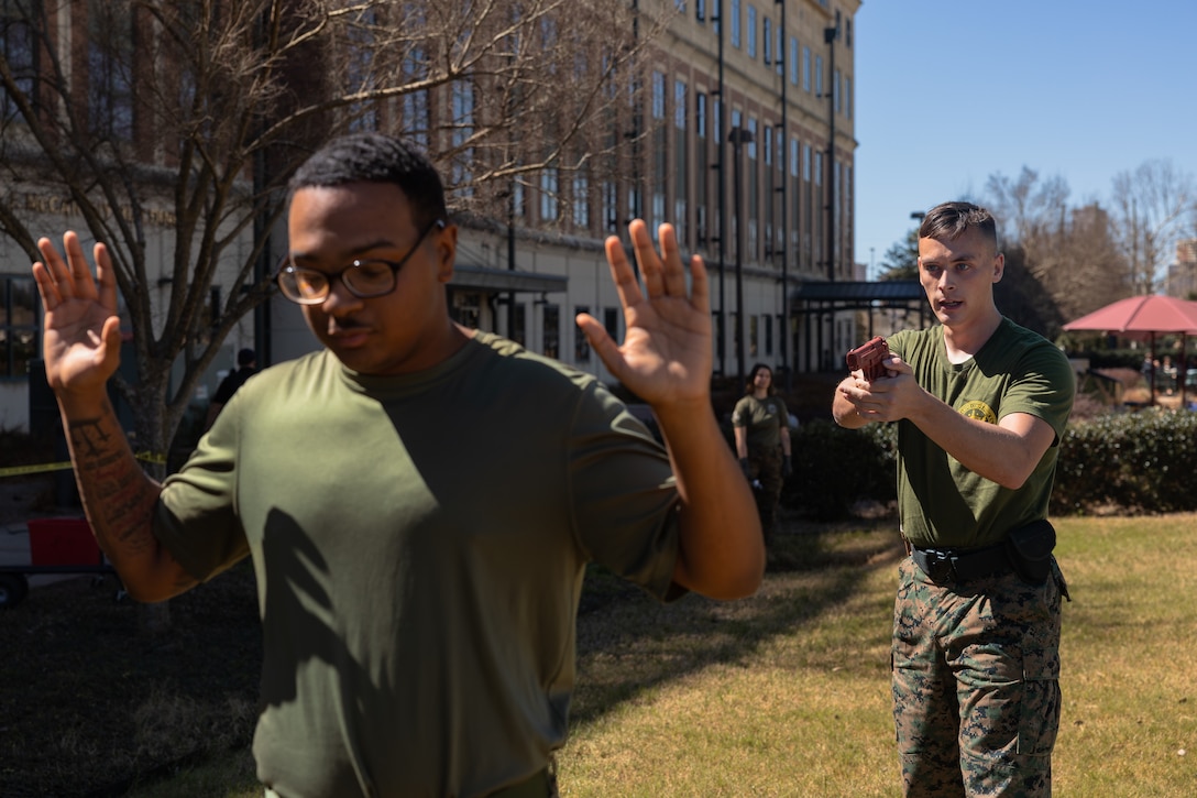 U.S. Marine Corps Sgt. Brady Bythewood, financial management resource analyst, Headquarters Battalion, Marine Forces Reserve, commands a simulated suspect during Security Augmentation Force training, Marine Corps Support Facility, New Orleans, Feb. 26, 2025. Marines experience the effects of pepper spray to learn when to use it appropriately as a method of de-escalation, and to understand how to defend themselves or apprehend suspects. (U.S. Marine Corps photo by Lance Cpl. Van Hoang)