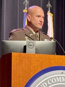 Lt. Col. Jacob Beard, officer-in-charge, 404th Maneuver Enhancement Brigade, thanks family, friends, and fellow Illinois Army National Guard Soldiers during his promotion ceremony March 15 at Heartland Community College in Normal, Illinois. (U.S. Army photo by Maj. Kanesha Newport)