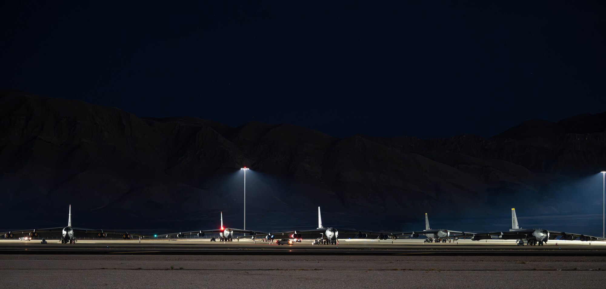 U.S. Air Force B-52H Stratofortresses assigned to the 23rd Bomb Squadron sit on the flightline during Red Flag 25-2 at Nellis Air Force Base, Nevada, March 11, 2025. Red Flag gives mission commanders the opportunity to lead forces in realistic combat scenarios in contested, degraded, and operationally limited environments to prepare and train them for future conflicts. (U.S. Air Force photo by Senior Airman Kyle Wilson)