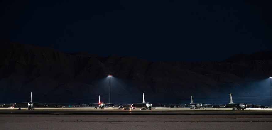 U.S. Air Force B-52H Stratofortresses assigned to the 23rd Bomb Squadron sit on the flightline during Red Flag 25-2 at Nellis Air Force Base, Nevada, March 11, 2025. Red Flag gives mission commanders the opportunity to lead forces in realistic combat scenarios in contested, degraded, and operationally limited environments to prepare and train them for future conflicts. (U.S. Air Force photo by Senior Airman Kyle Wilson)